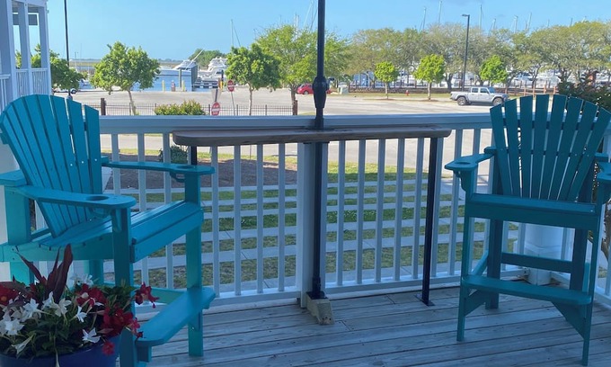 Southport Condo | Southport Yachty Dog! Spacious condo with water views and Pet-Friendly!
