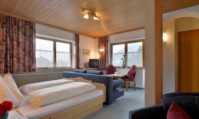 Koessen Apartment | Doppelzimmer mit Zusatzbett - Pension Gieringer