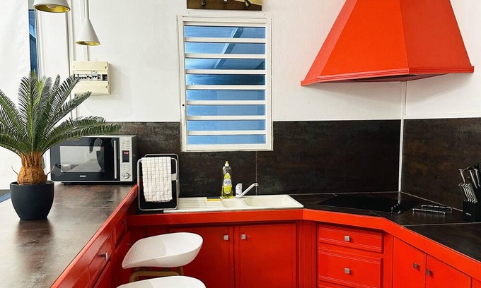 Sainte-Rose House | Homerez - House 5 km away from the beach for 2 ppl. with shared pool and terrace