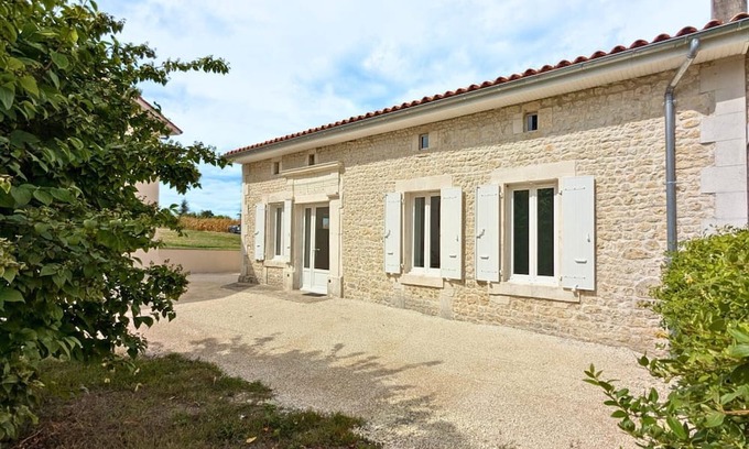 Challignac Cottage | Renovated Charente house with private garden and parking