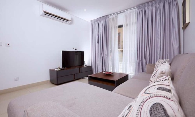 East Legon Apartment | Chic 1-bedroom apartment in marvelous Accra with fitness room, AC