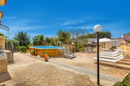 San Pietro in Bevagna House | Villa La Mimosa by BarbarHouse